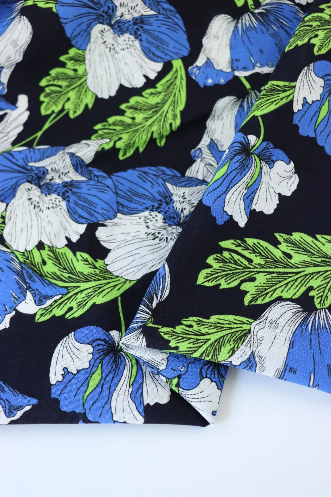 1YD 12IN REMNANT; Blue & White Floral on Black Linen Blend