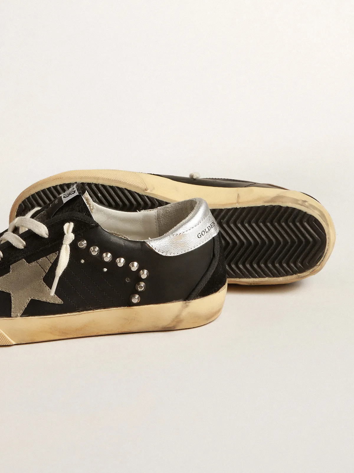 Men’s Super-Star in black leather and suede with silver studs