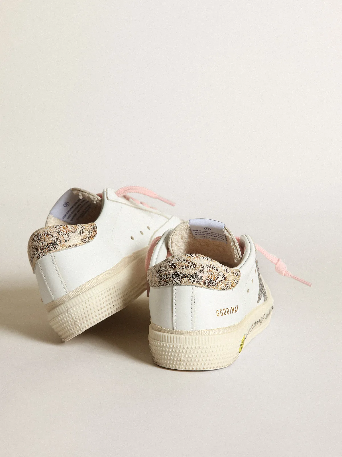 Young May with silver glitter star and leopard print heel tab
