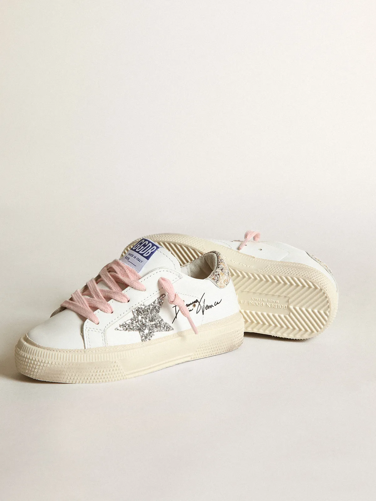 Young May with silver glitter star and leopard print heel tab